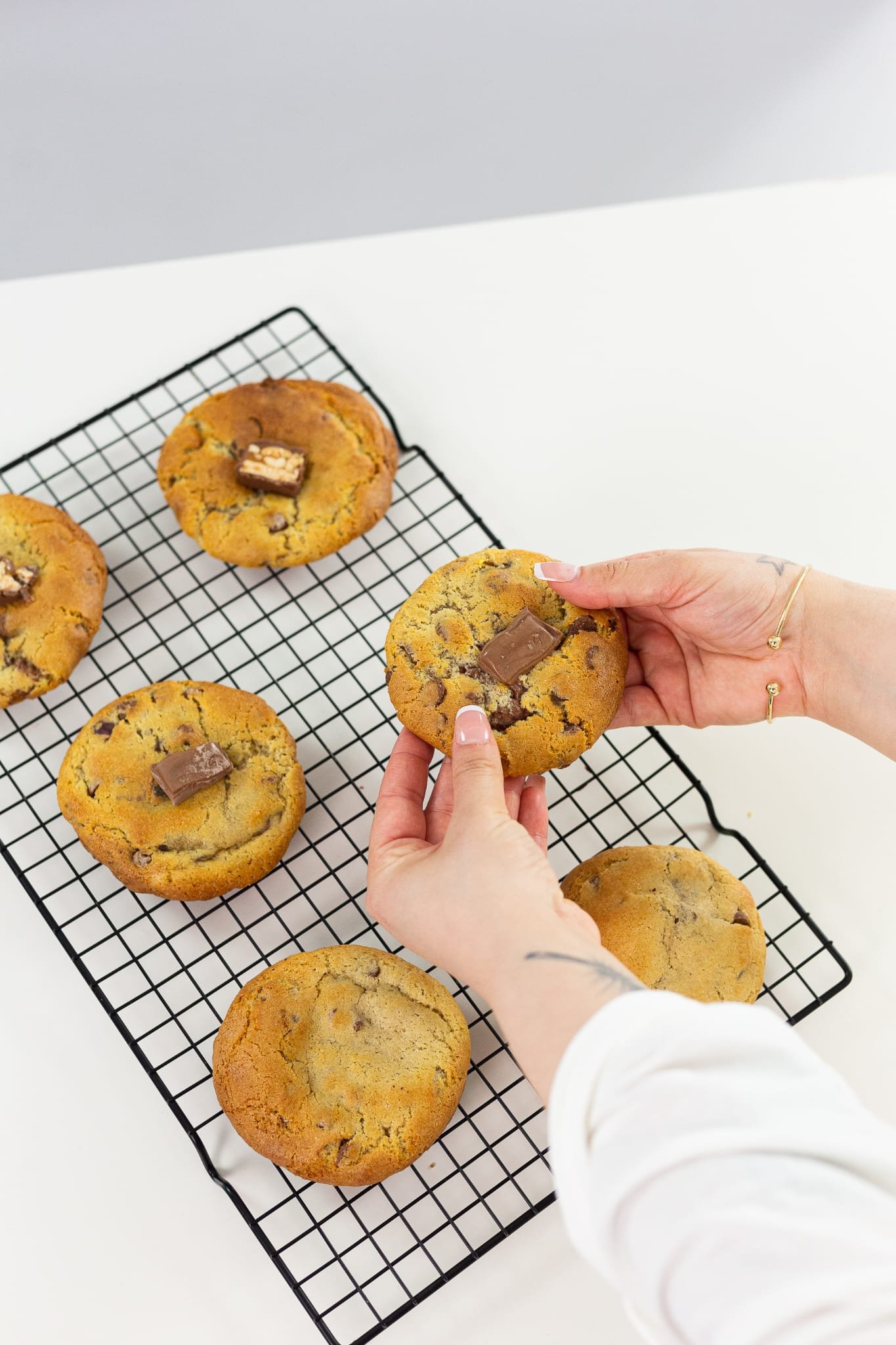 Freshly baked cookies on a cooling rack