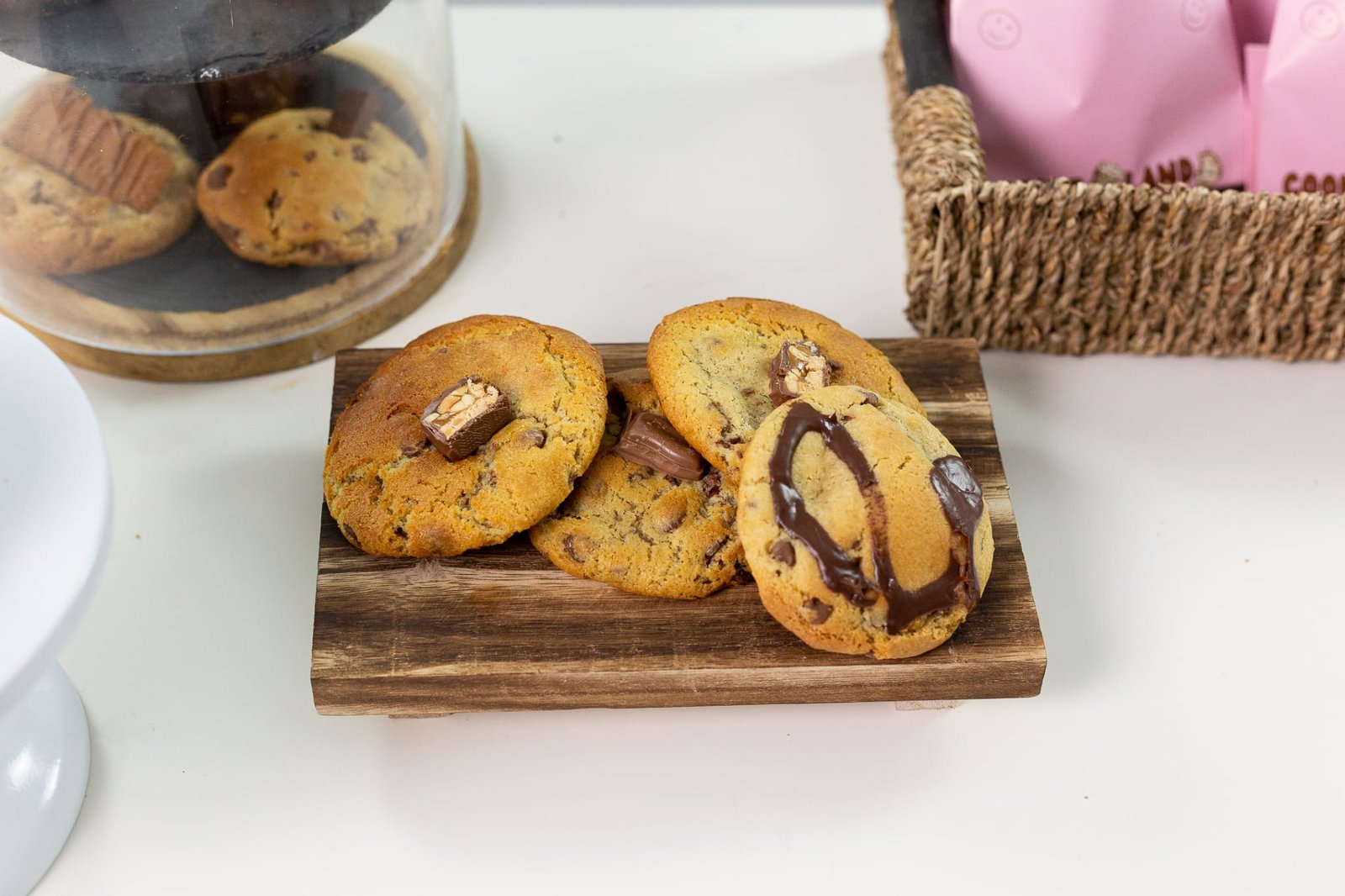 Cookies on display with pink Cookieland bags